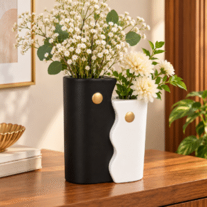 Black and white interlocking ceramic vase set with matte finish styled with flowers