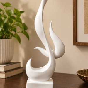 Alternate view of the white abstract resin showpiece featuring flowing sculptural curves and a rectangular base.